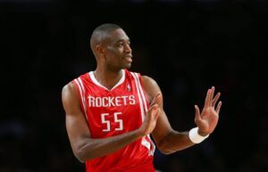 Dikembe-Mutombo-55-of-the-Houston-Rockets-gestures-during-the-game-1536x988